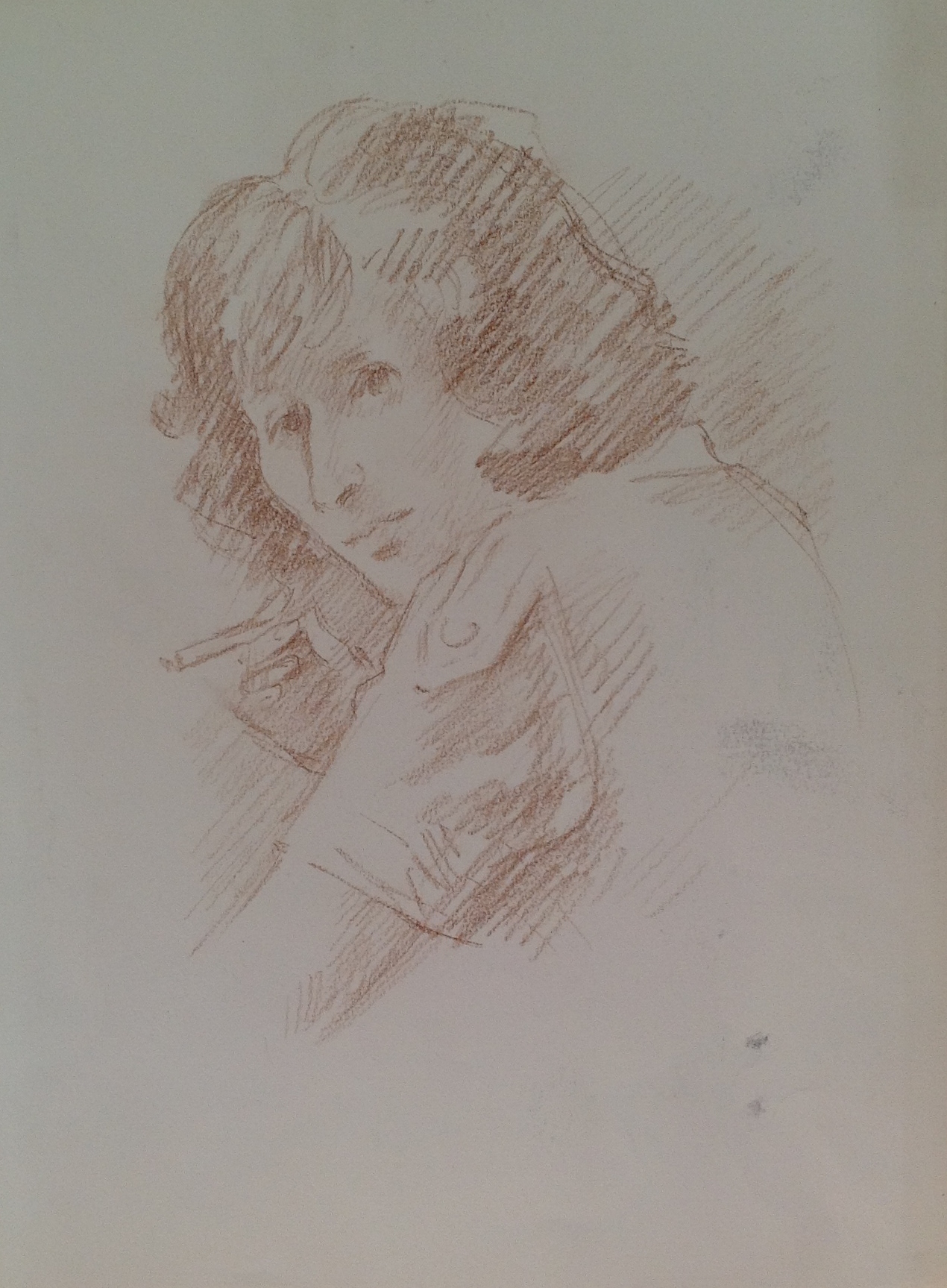 Ritratto di una donna profilo di una giovane donna di Gigi Busato. Disegno a sanguigna su carta . Collezione di famiglia