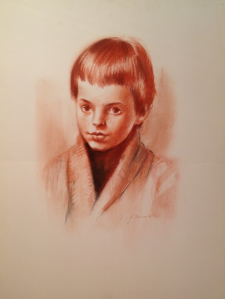 Il primo ritratto di Gigi Busato. Ritratto di un giovane bambino in posa. Disegno sanguigna su carta, collezione di famiglia